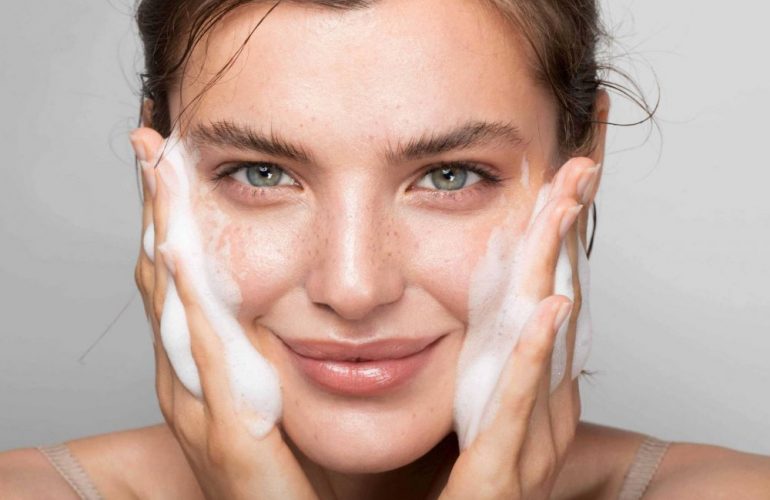 woman-washing-face-foaming-soap